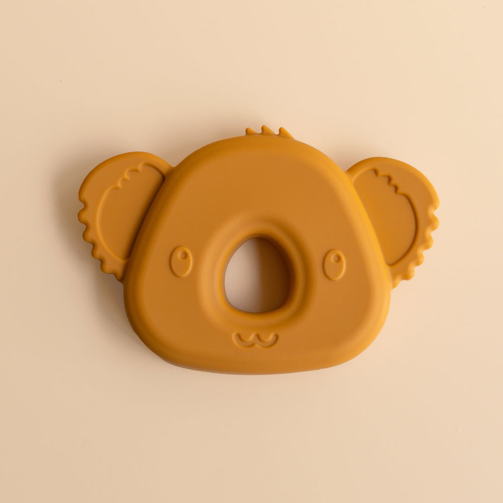 A baby teether like a koalas head, bamboo and silicon, back view