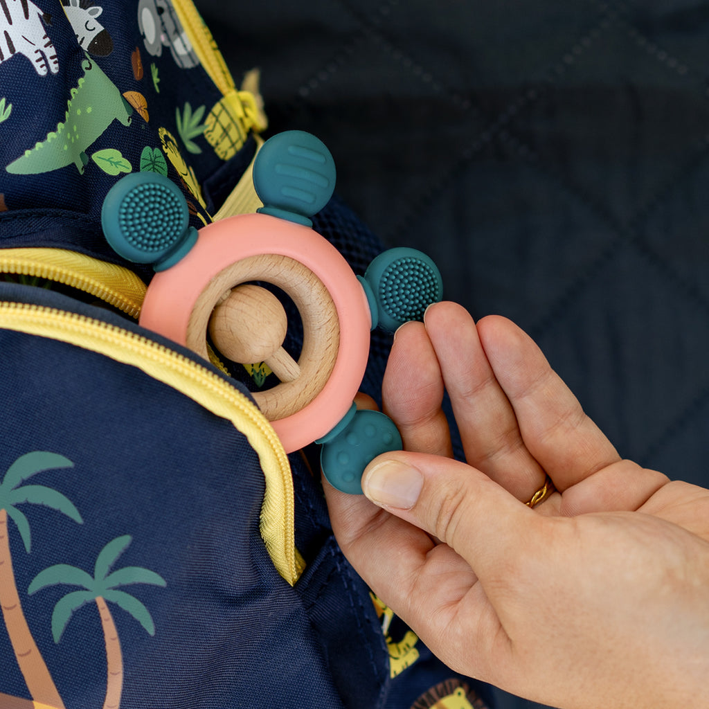 Silicon and bamboo teether for soothing baby toy, in use view